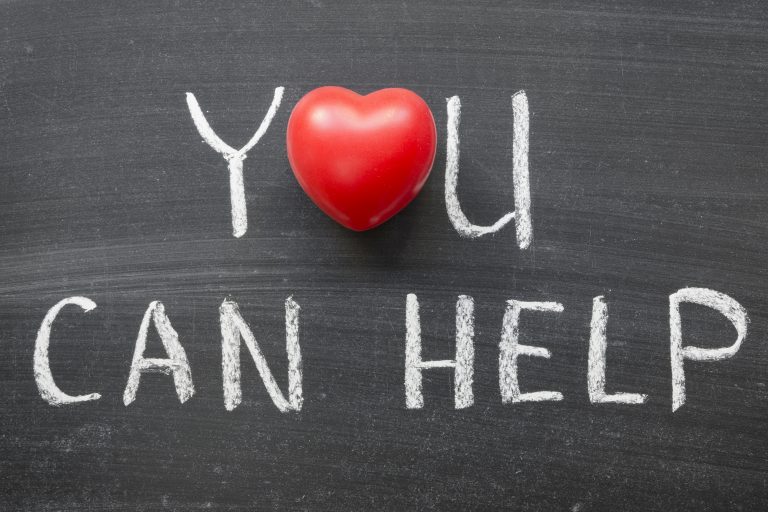 About Charity Truth: Photo with blackboard with “You can help” written on it.