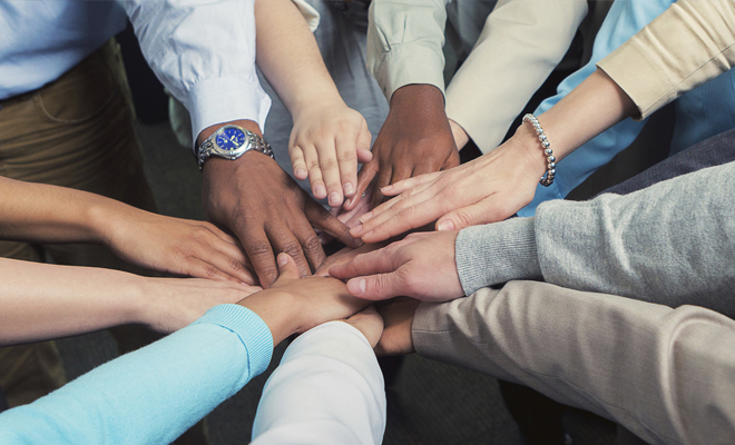 group hands as a team