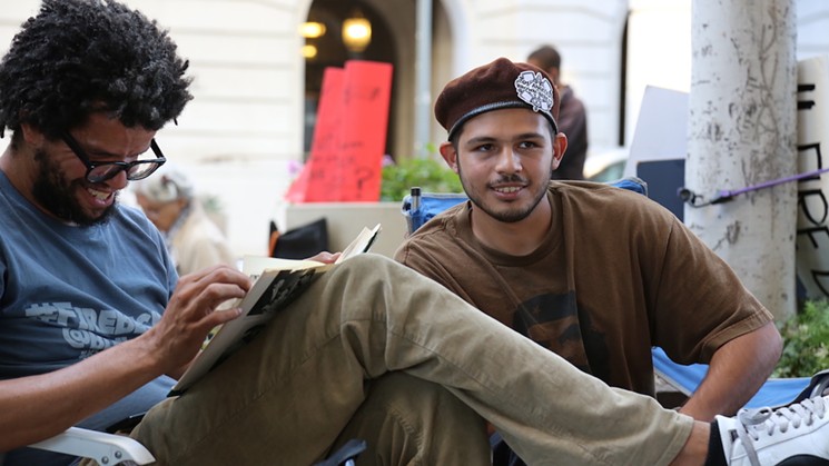 two men smiling