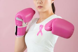 woman punch out for against breast cancer - united breast cancer foundation